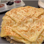 Tarte rustique courgette, burrata et parmesan : une recette d’été simple, fondante et gourmande